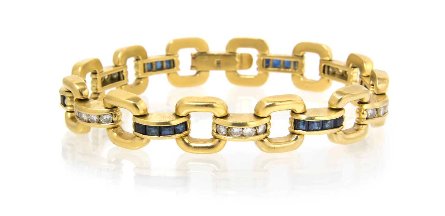 An 18 Karat Yellow Gold, Diamond and Sapphire Bracelet, 19.10 dwts.