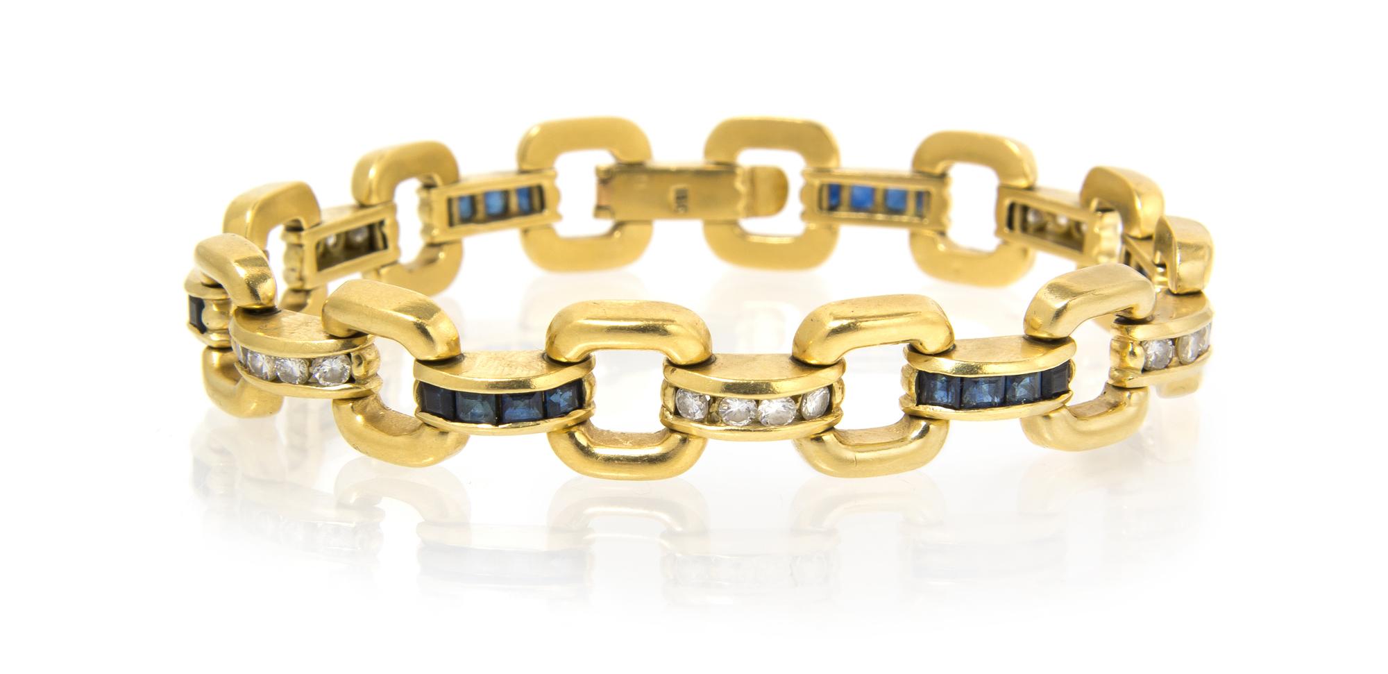 An 18 Karat Yellow Gold, Diamond and Sapphire Bracelet, 19.10 dwts.