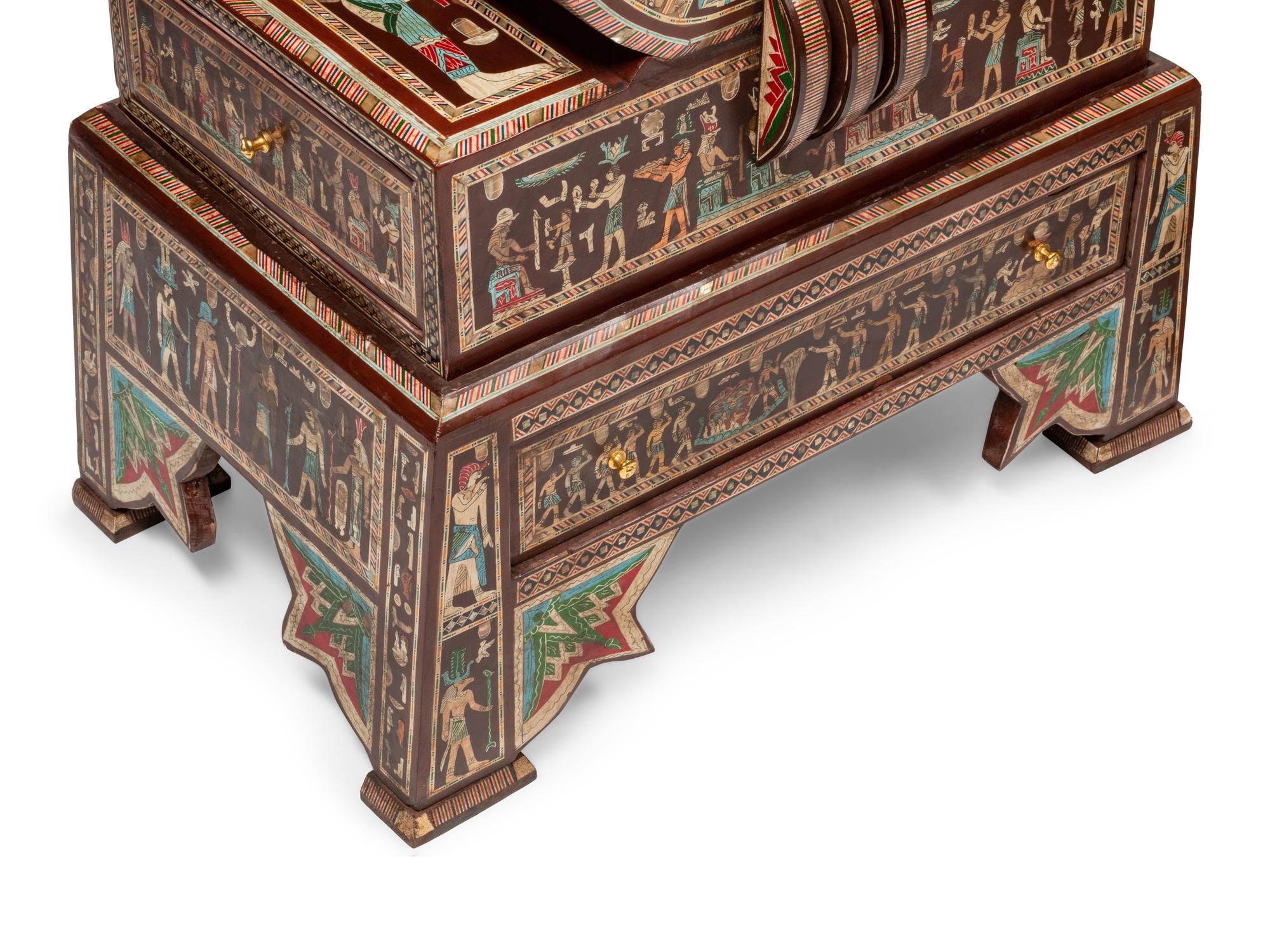 A Pair of Egyptian Style Painted and Inlaid Cabinets
