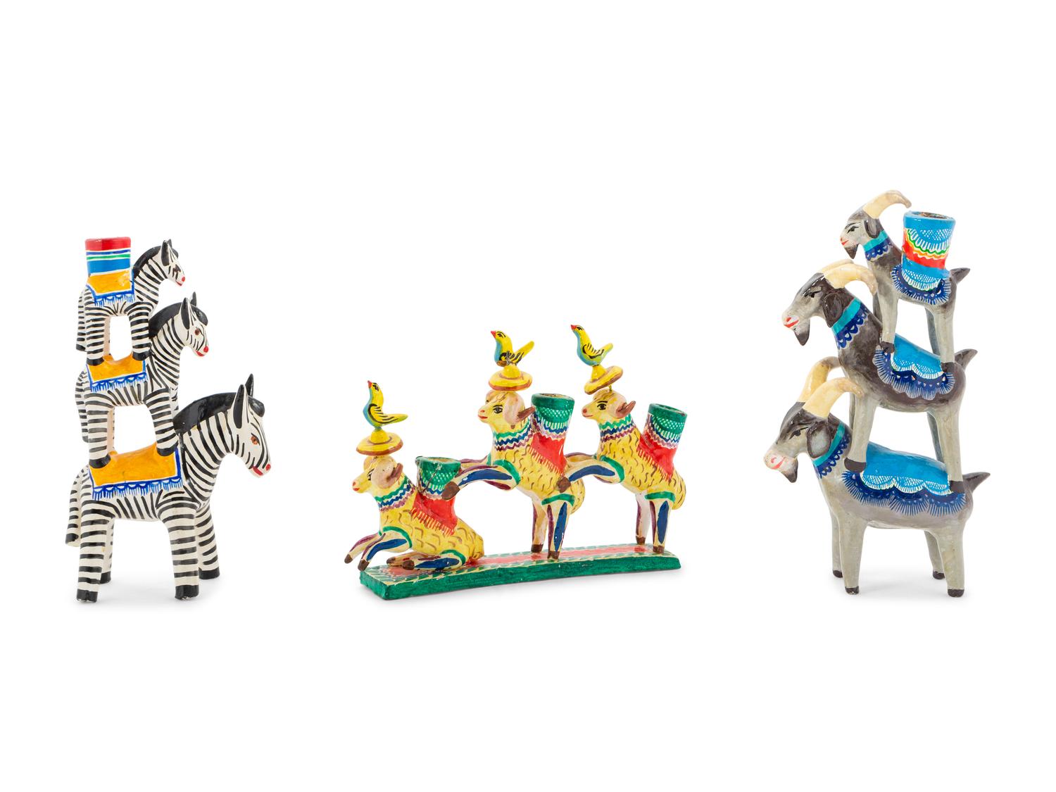 A Collection of Mexican Pottery Candelabra