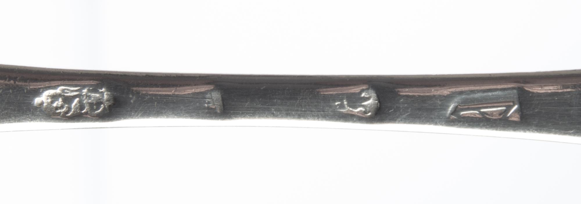 A Queen Anne Britannia Silver Table Spoon, Thomas Sadler, London, 1706, the underside with stippled initials P.H.E.