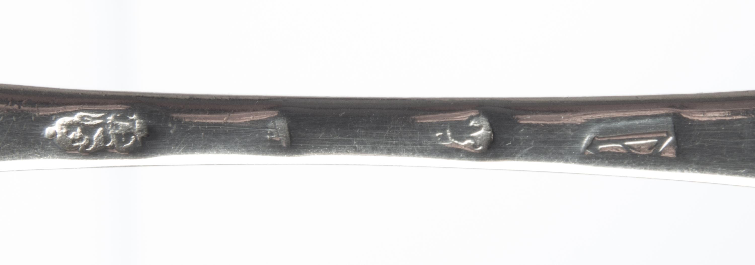 A Queen Anne Britannia Silver Table Spoon, Thomas Sadler, London, 1706, the underside with stippled initials P.H.E.