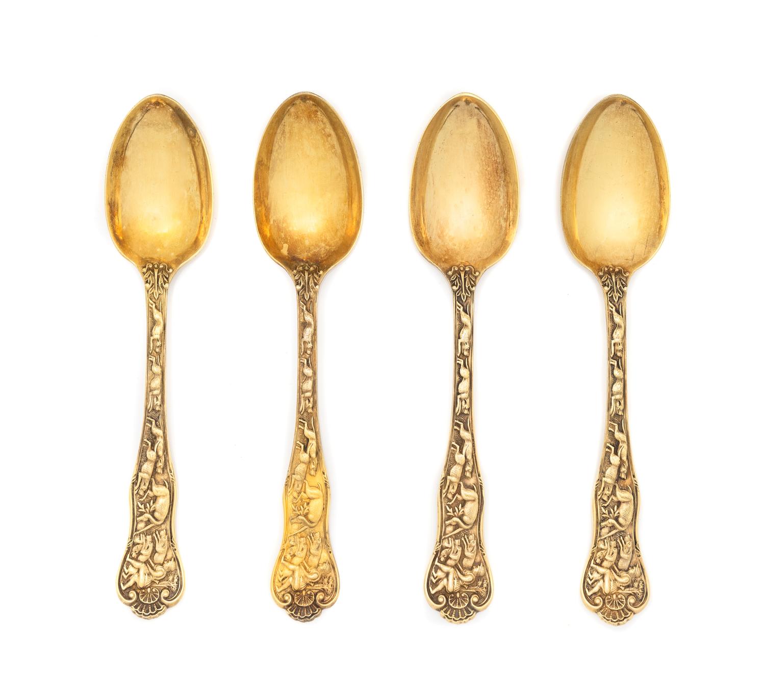 A Set of Four English Silver-Gilt Dessert Spoons