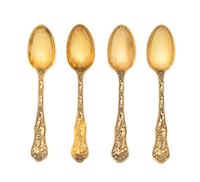 A Set of Four English Silver-Gilt Dessert Spoons