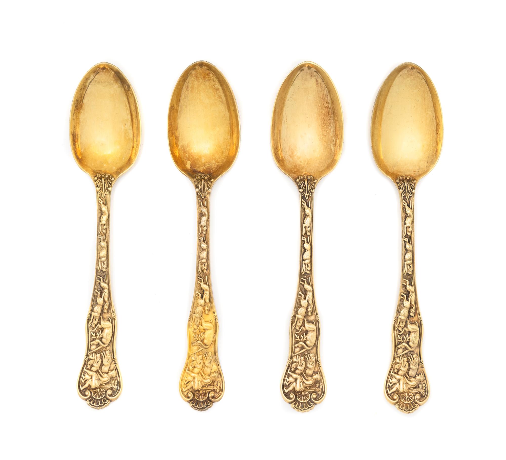 A Set of Four English Silver-Gilt Dessert Spoons