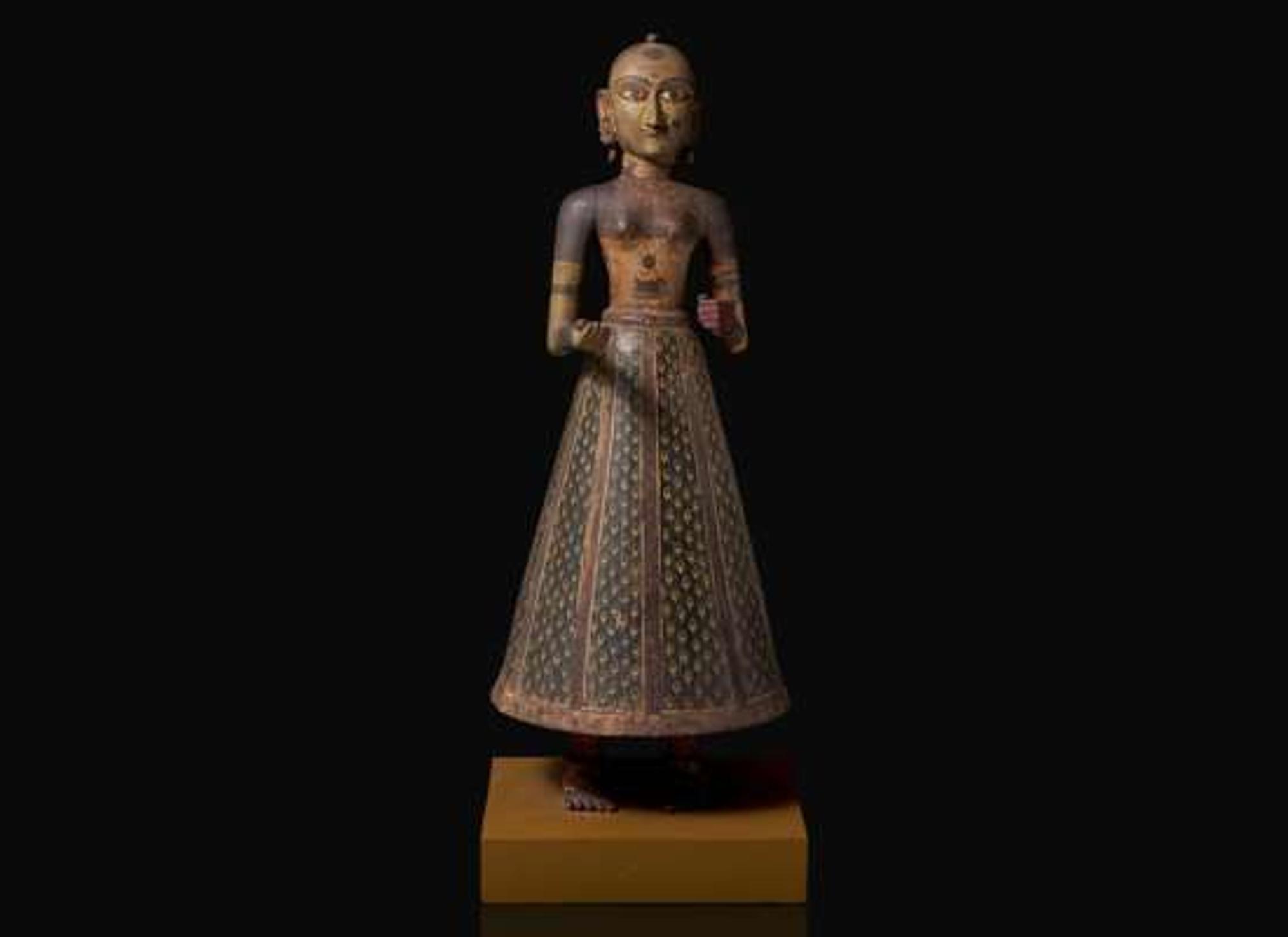 An Indian carved and painted wood Gauri figure, Rajasthan, 19th to early 20th century 印度女神祗木雕 拉賈斯坦邦 十九至二十世紀初