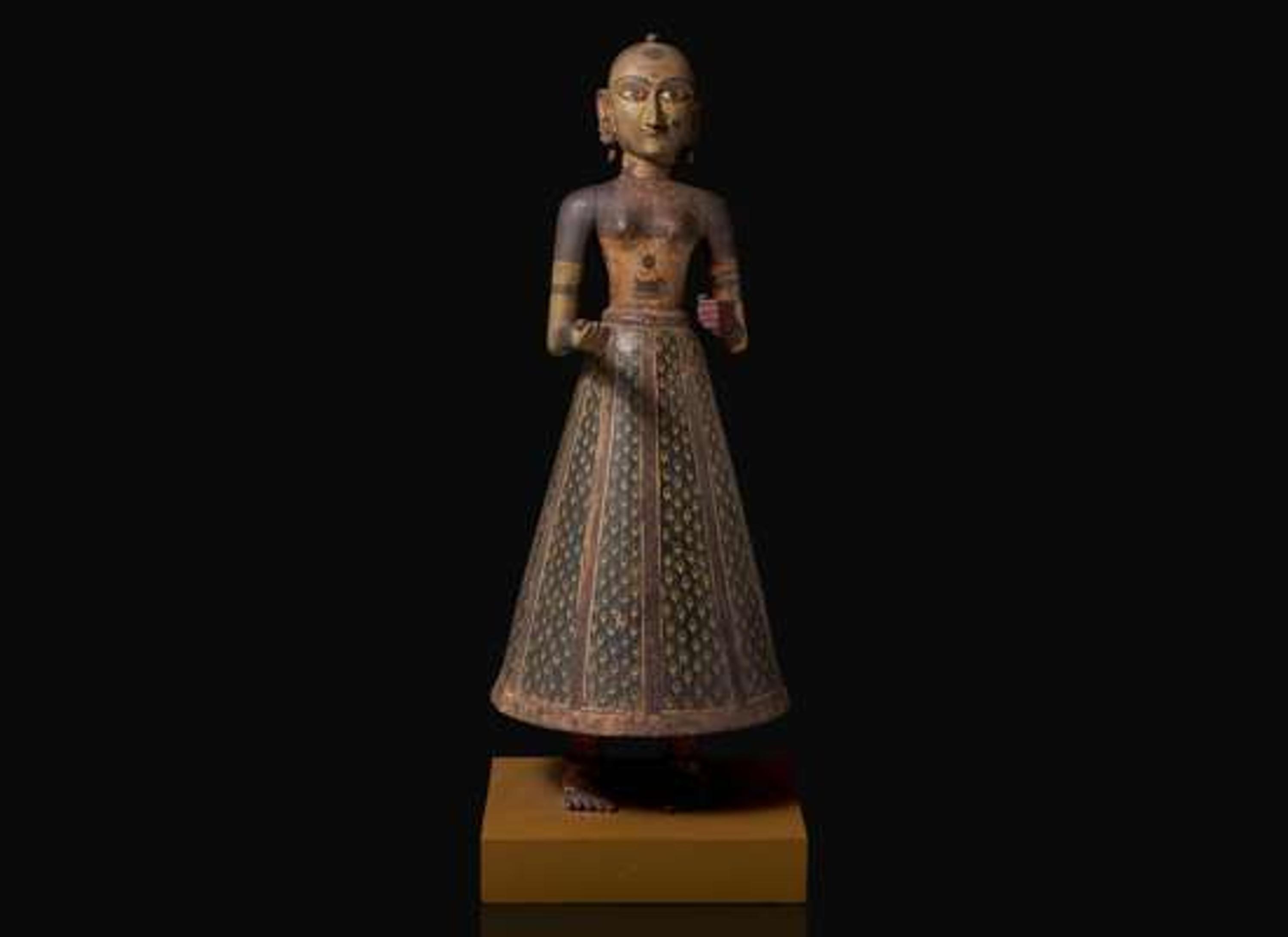 An Indian carved and painted wood Gauri figure, Rajasthan, 19th to early 20th century 印度女神祗木雕 拉賈斯坦邦 十九至二十世紀初