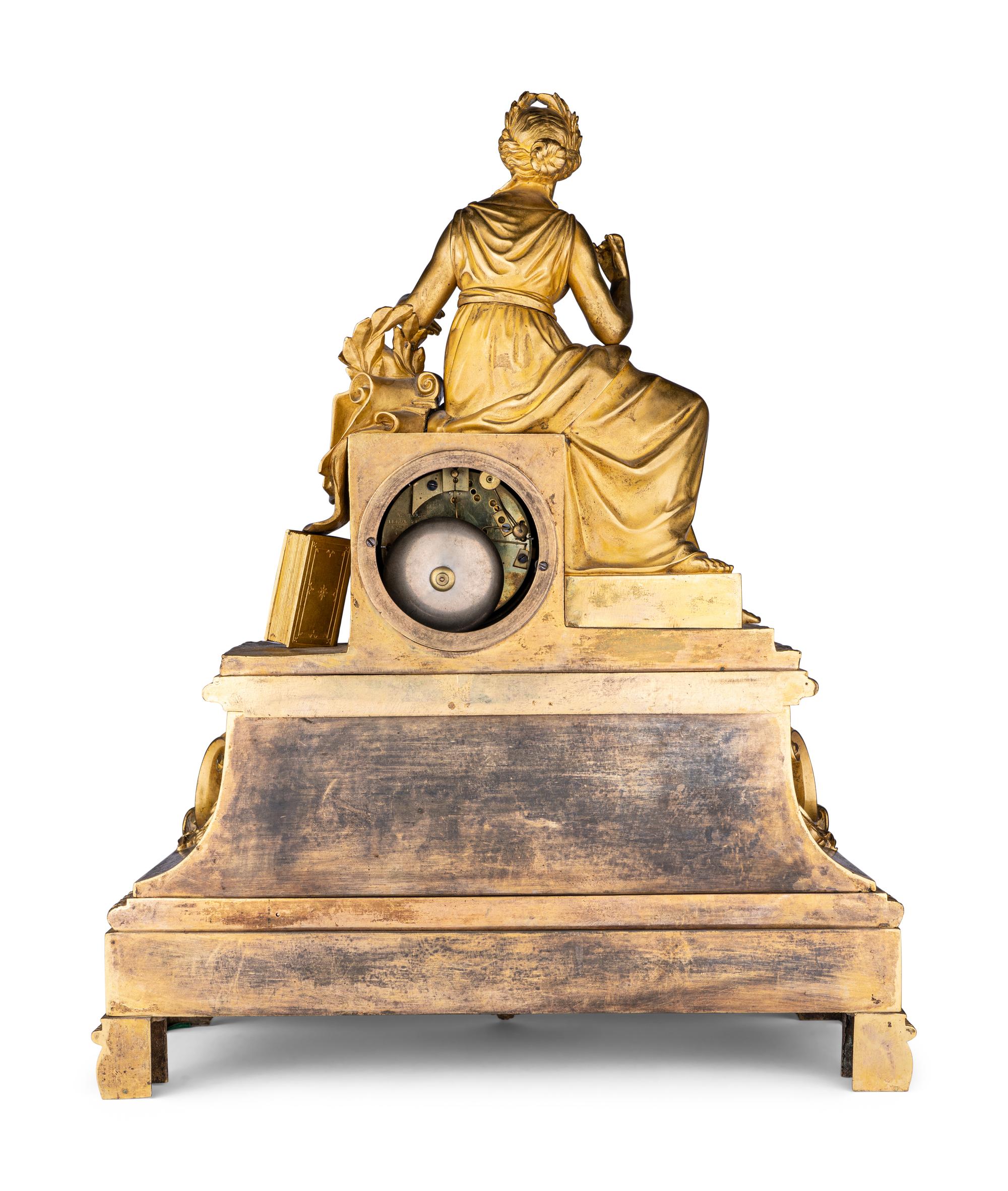 A Napoleon III Gilt Bronze Figural Mantel Clock