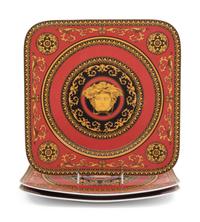 A Group of Versace Medusa Porcelain Table Articles