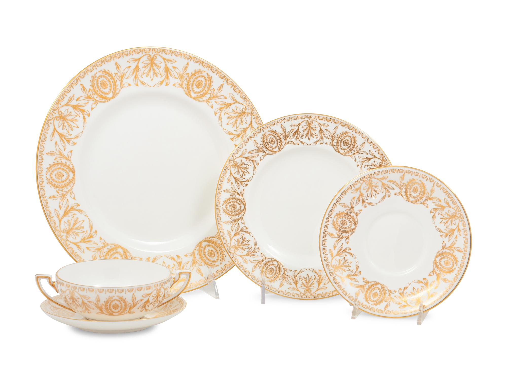 A Royal Worcester Pompadour Porcelain Dinner Service