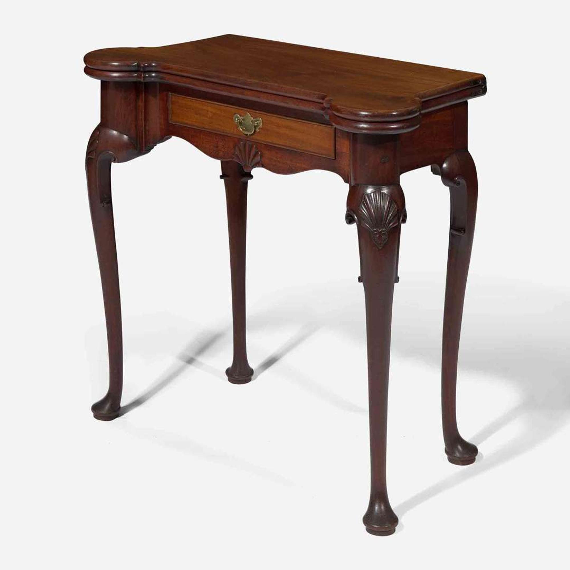 An Irish George II carved mahogany games table circa 1750