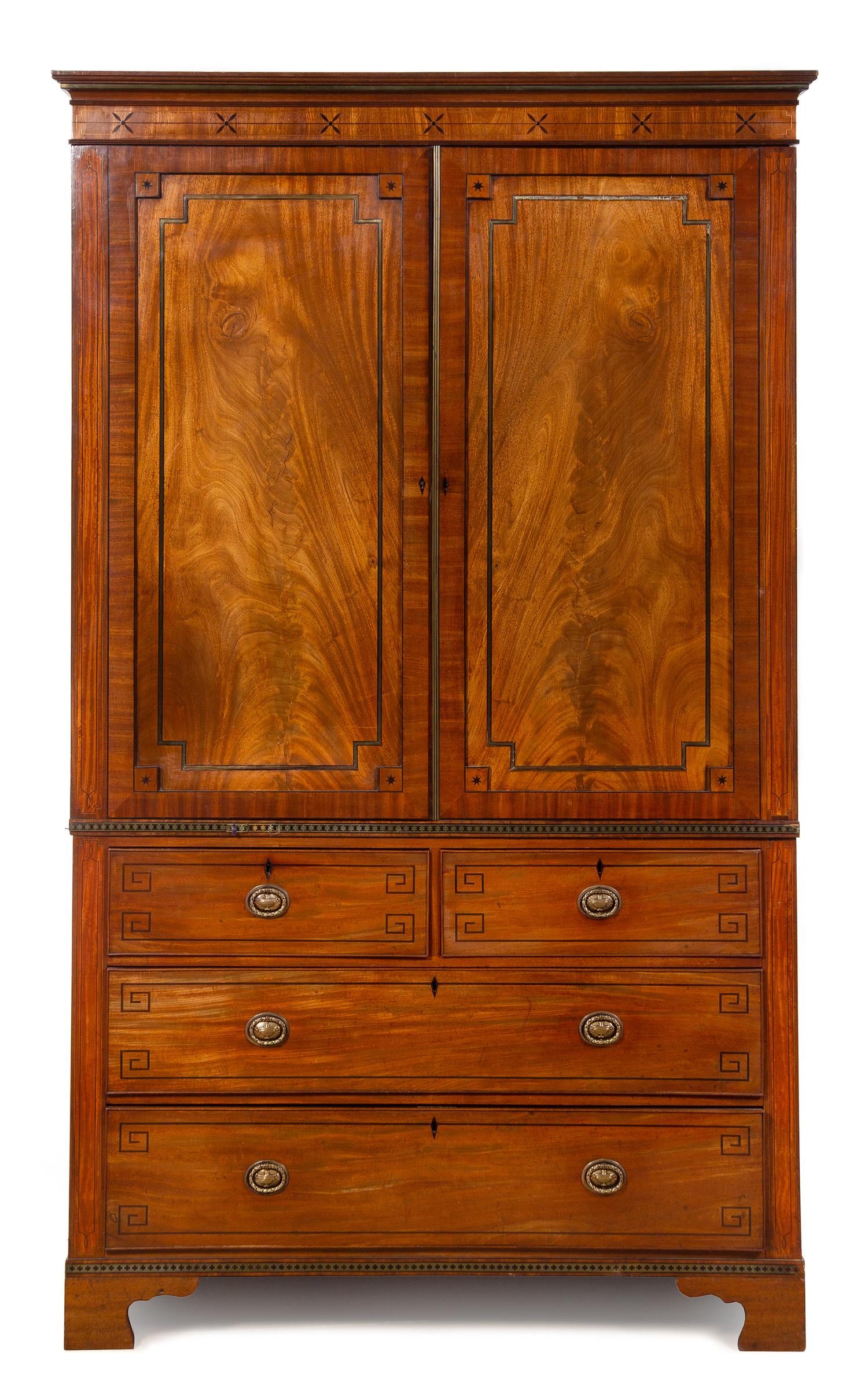 An English Inlaid Mahogany Linen Press Height 87 x width 50 1/8 x depth 21 inches. — 19TH CENTURY