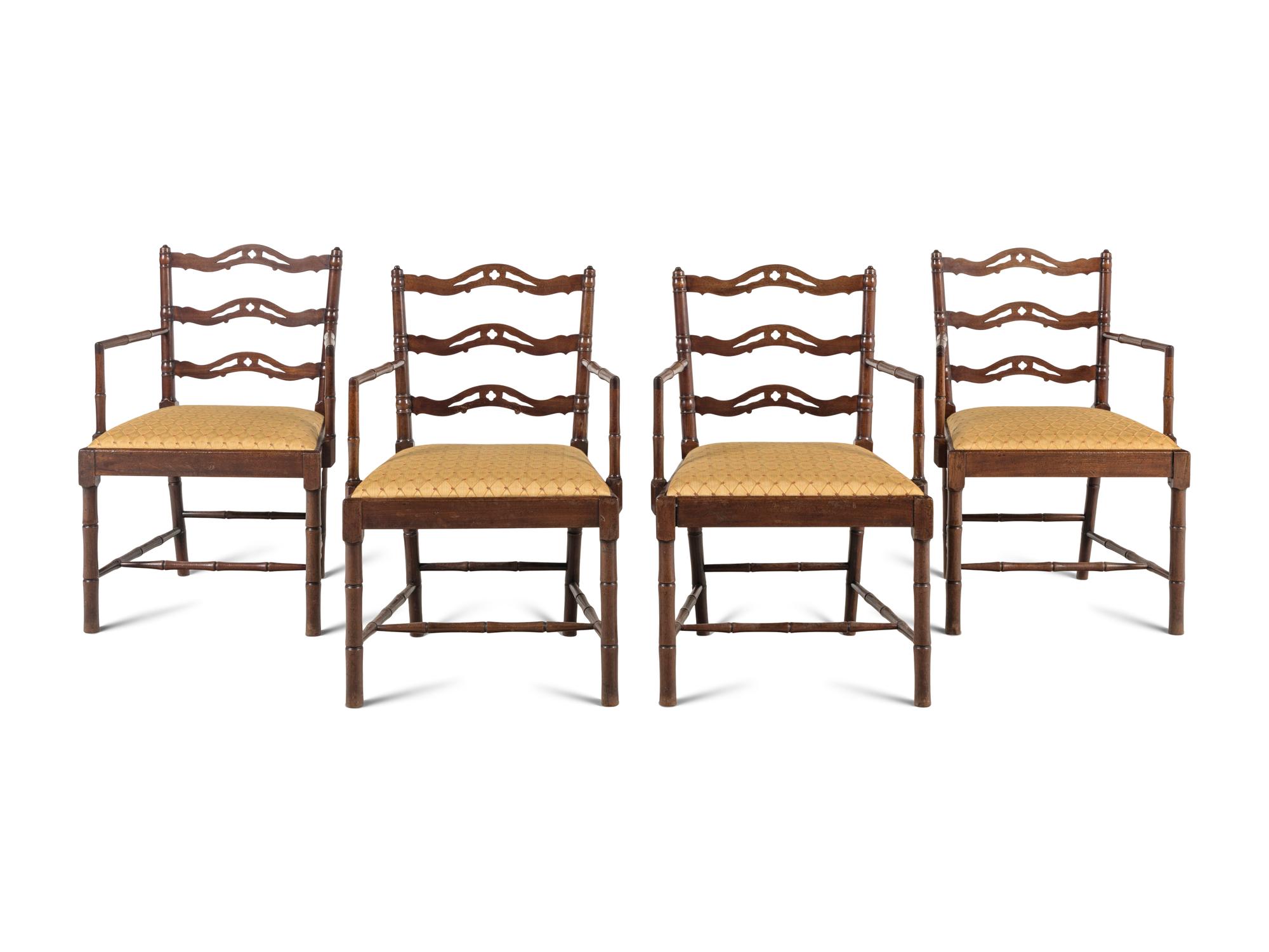 A Set of Four English Mahogany Faux-Bamboo Arm Chairs