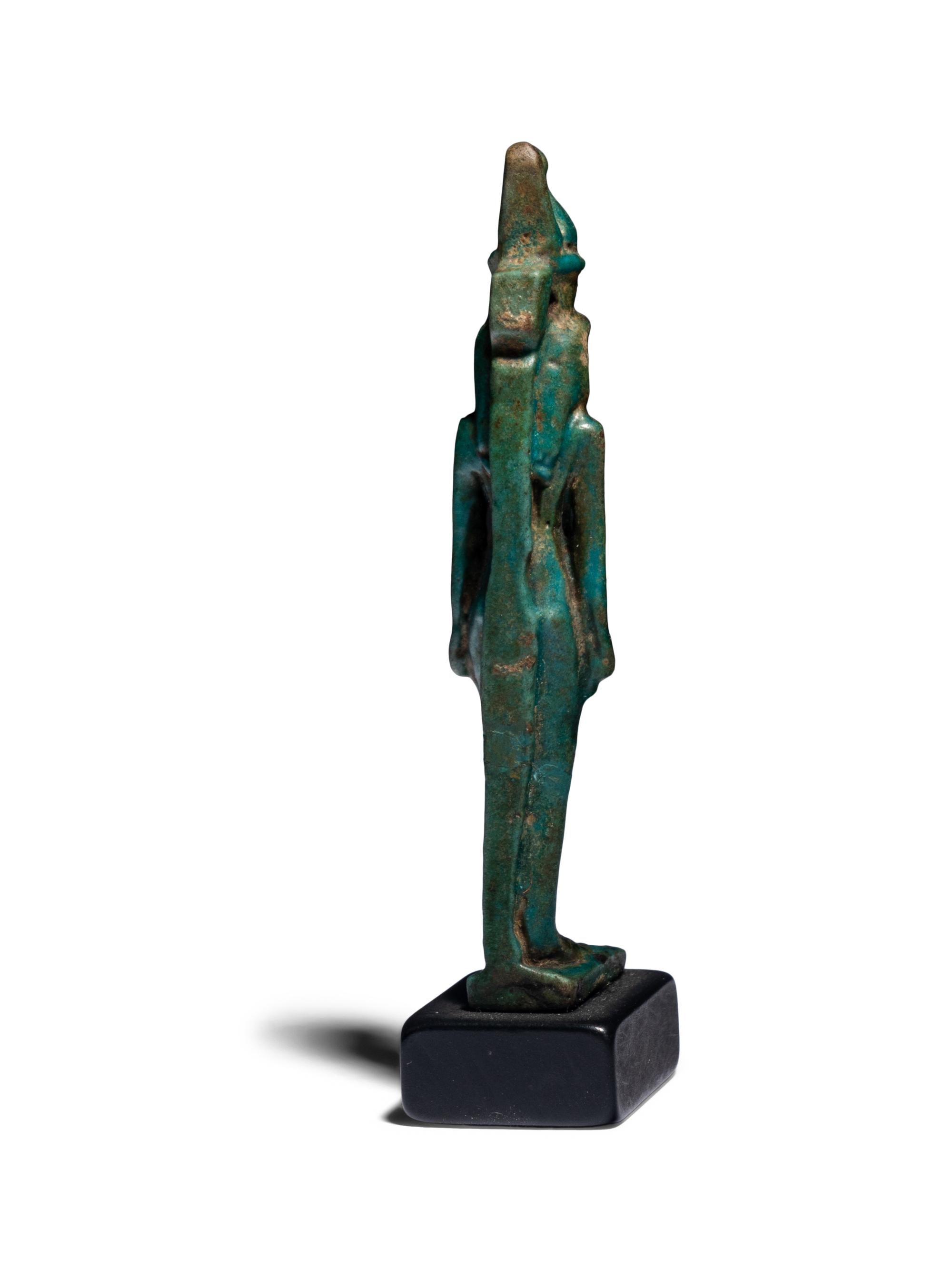 An Egyptian Faience Mut Amulet
