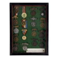 [Civil War]. A group of Civil War-era CDV albums and post-war reunion badges.