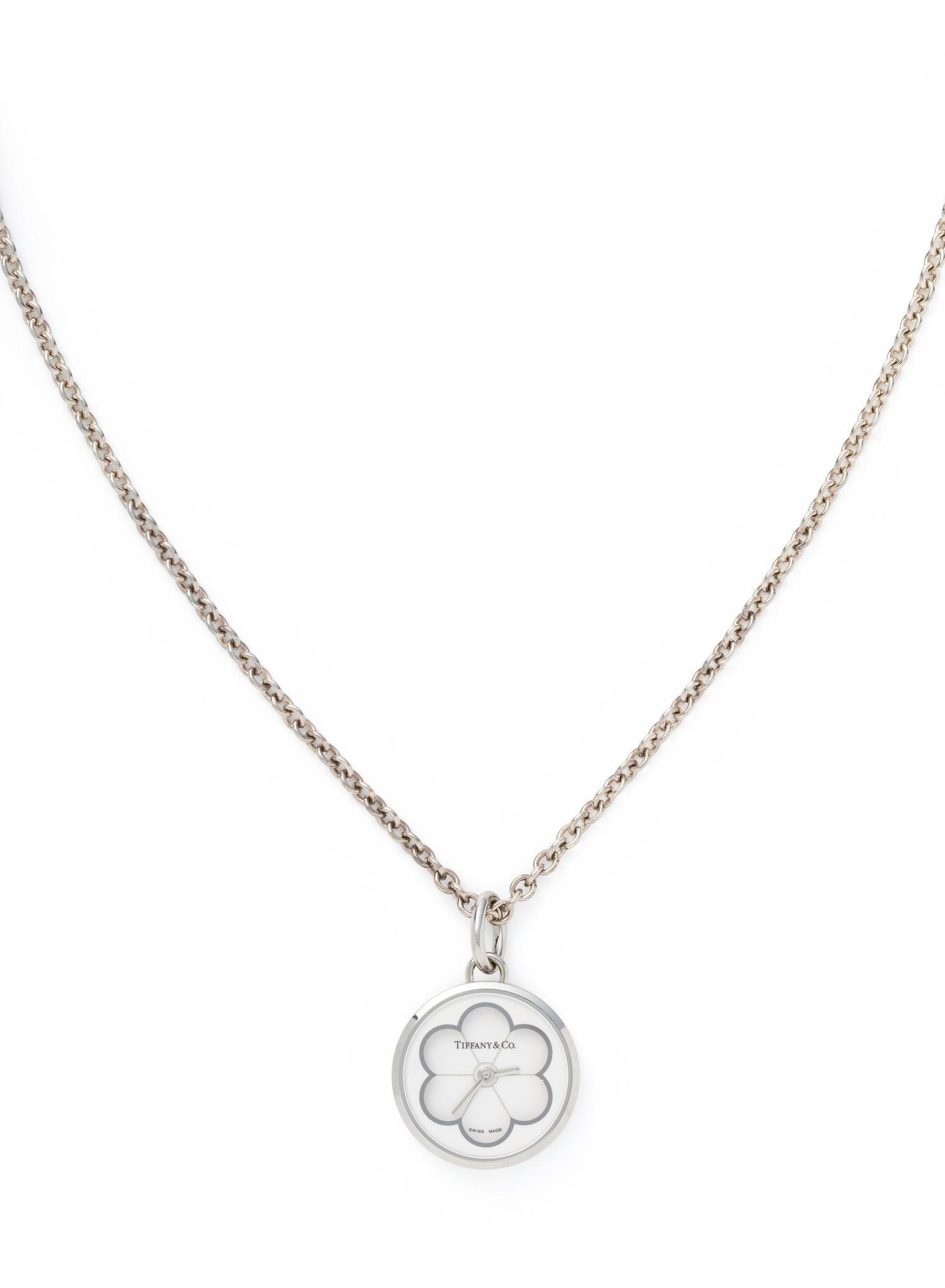 TIFFANY & CO. STAINLESS STEEL, STERLING SILVER AND ENAMEL PENDANT/WATCH