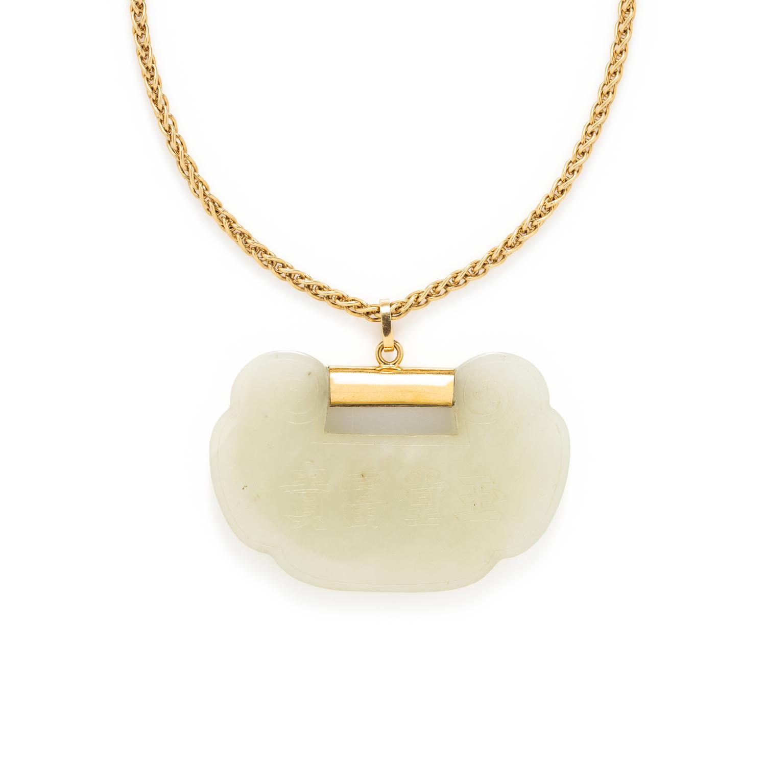 YELLOW GOLD AND CARVED JADE NECKLACE