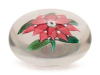 A Magenta Poinsettia Glass Paperweight
