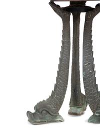 A Grotto Style Marble Inset Cast Iron and Bronze Dolphin-Base Pedestal Table