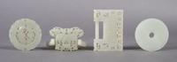 A Group of Four Chinese Jade Carved Items, Width of widest 2 3/4 inches.