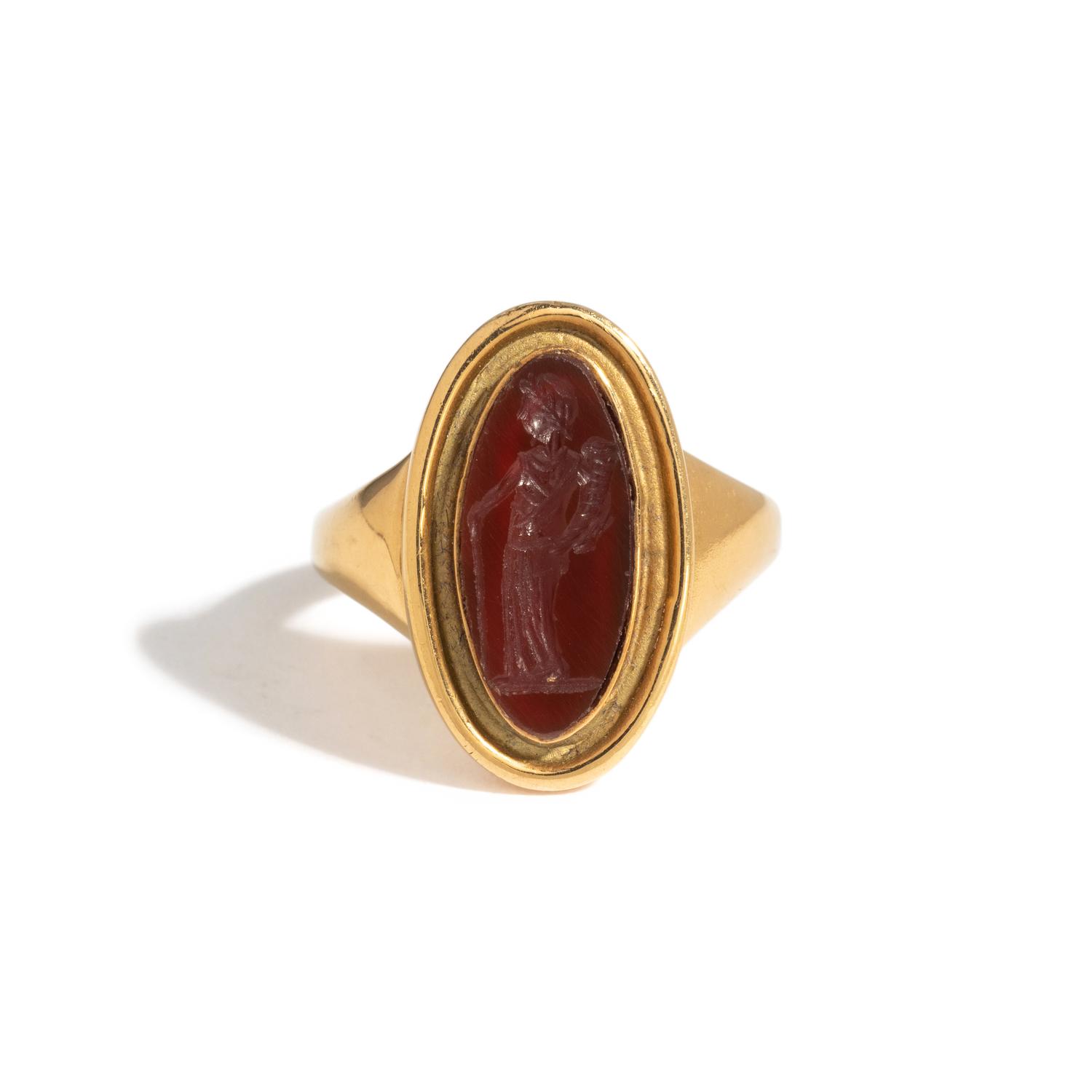 A Roman Carnelian Ring Stone with the Goddess Ceres — Set in a gold ring