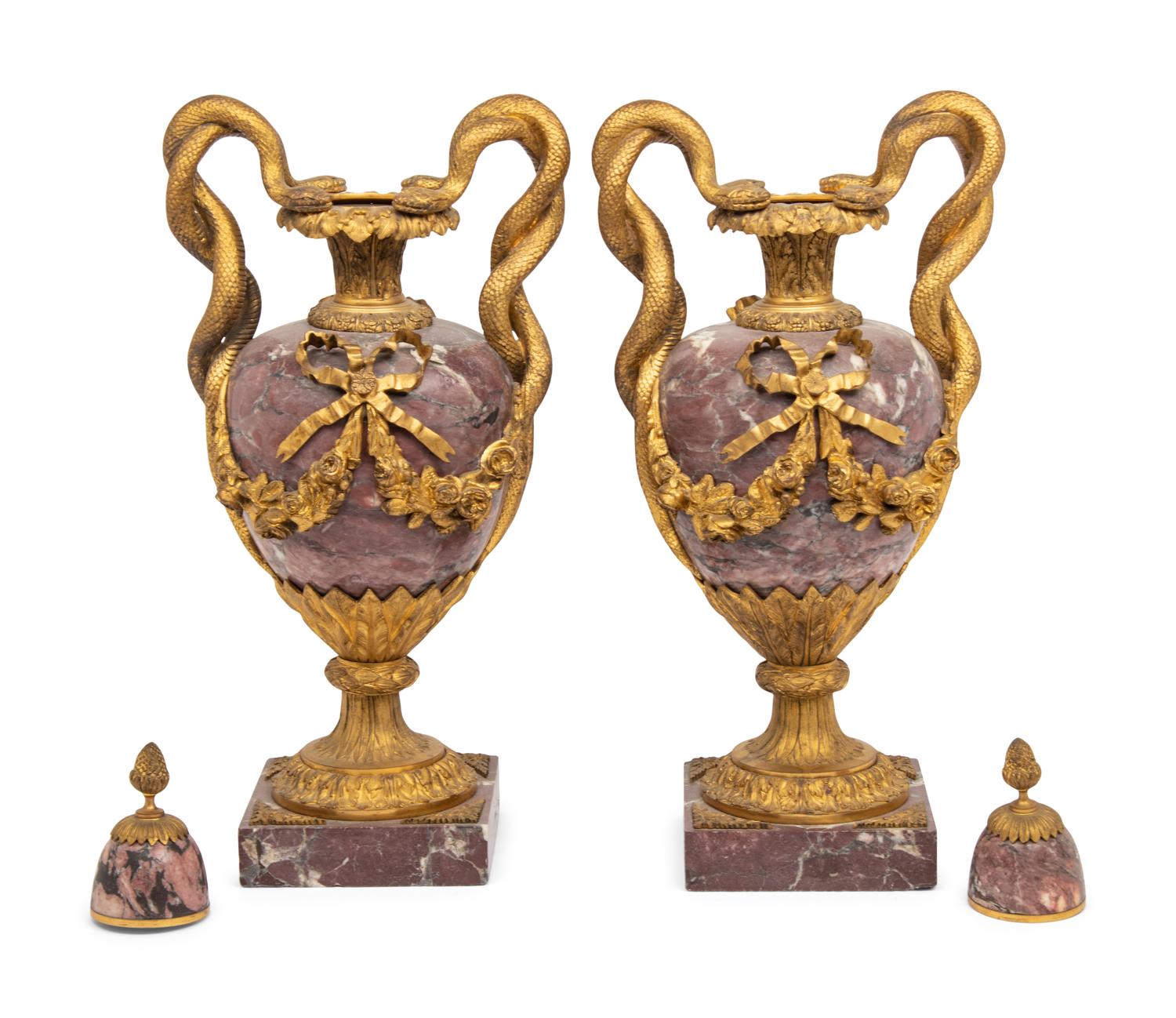 A Pair of French Gilt Bronze Mounted Breche Violette Urns
