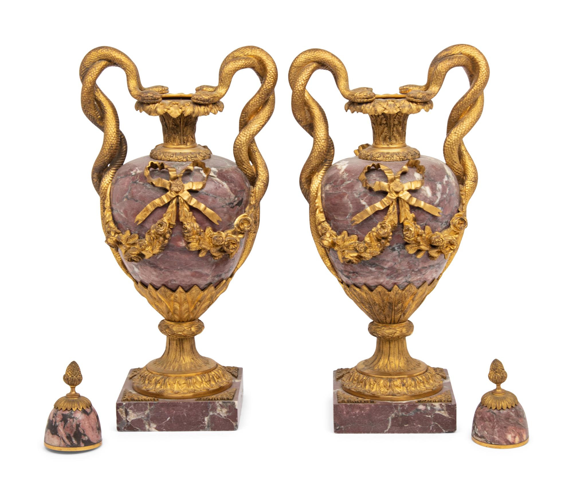 A Pair of French Gilt Bronze Mounted Breche Violette Urns