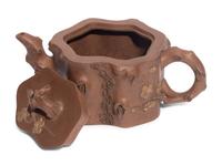 A Chinese Yixing Zisha Pottery Teapot and Four Teacups