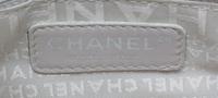 A Chanel Light Brown Caviar Leather Handbag, 12" x 8" x 5".
