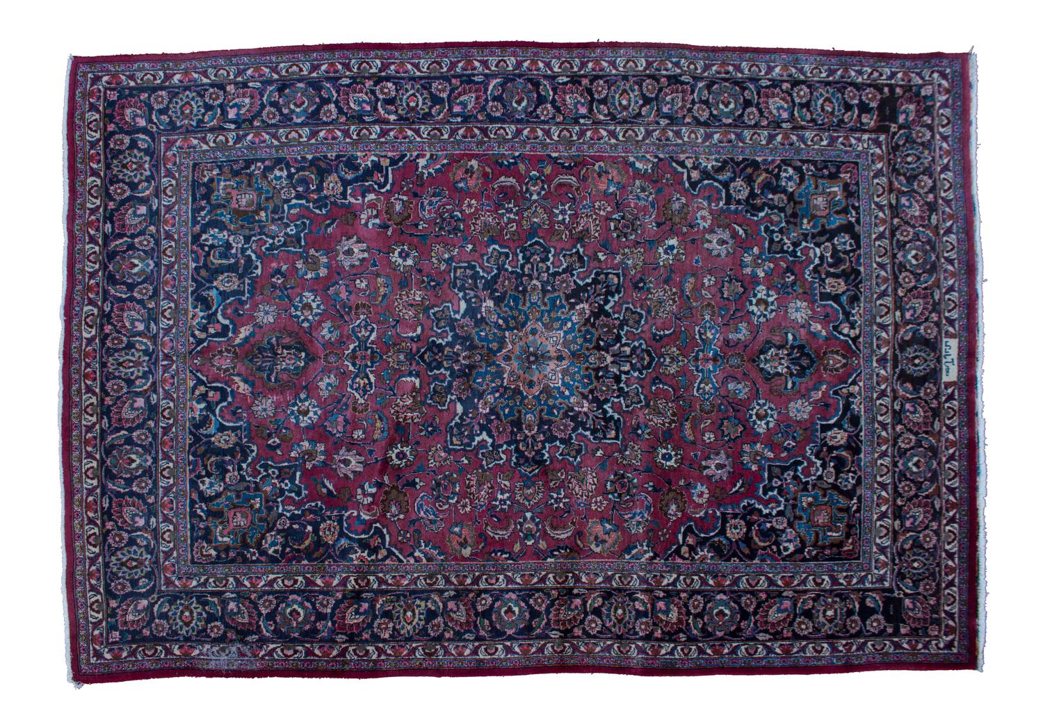 A Sarouk Wool Rug 11 feet 3 1/2 inches x 8 feet.
