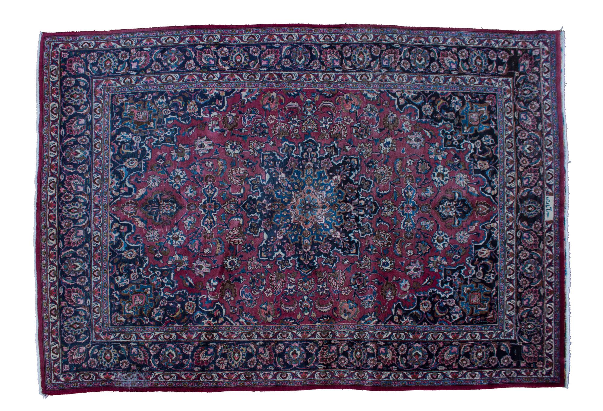 A Sarouk Wool Rug 11 feet 3 1/2 inches x 8 feet.