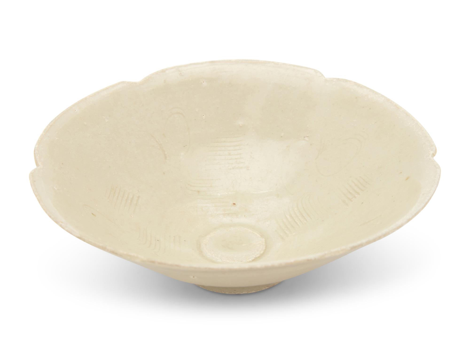 A Chinese Pale Celadon Glazed Porcelain 'Combed' Bowl