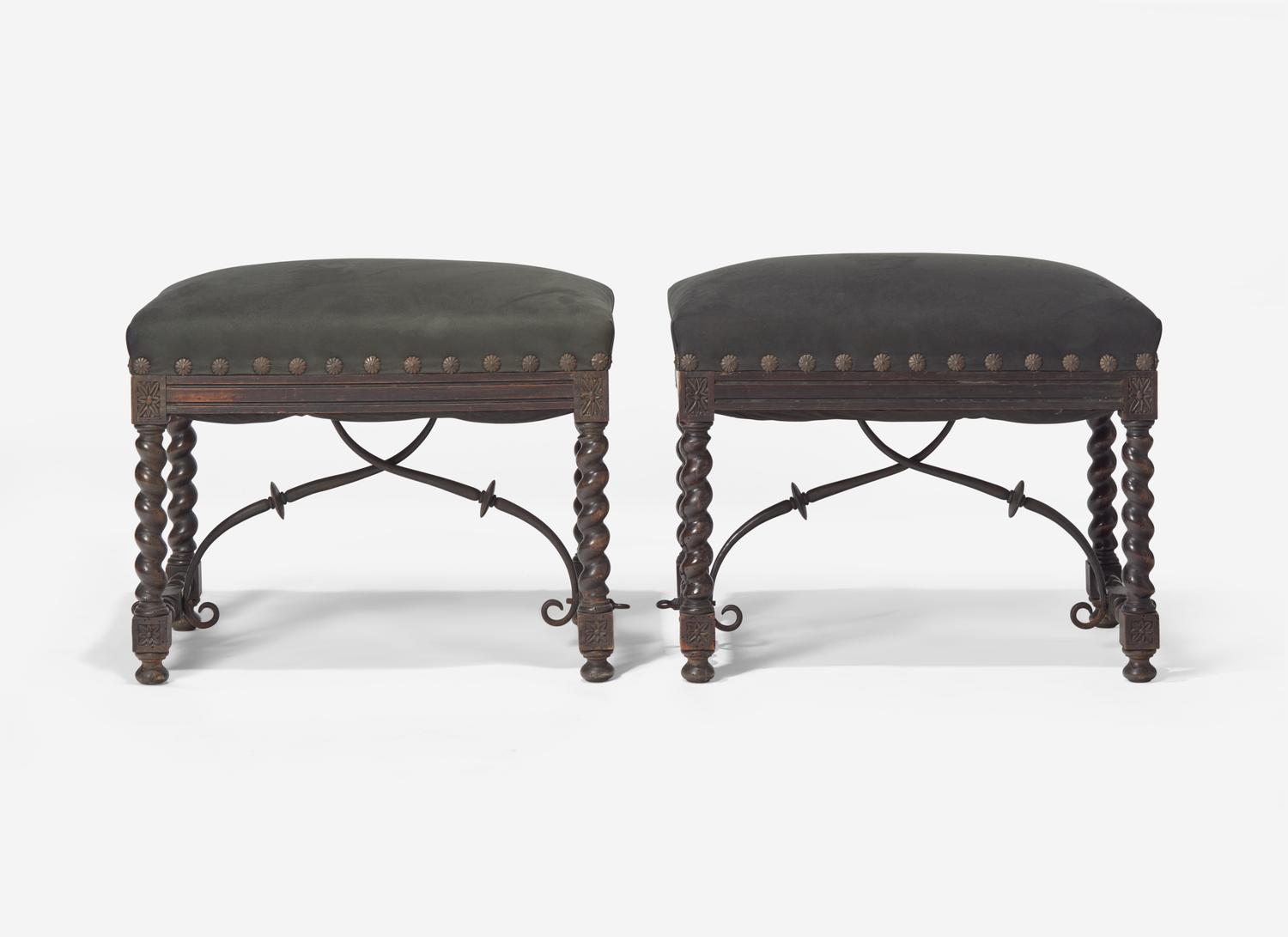 A Pair of Spanish Baroque Style Stained Beechwood and Wrought Iron Stools