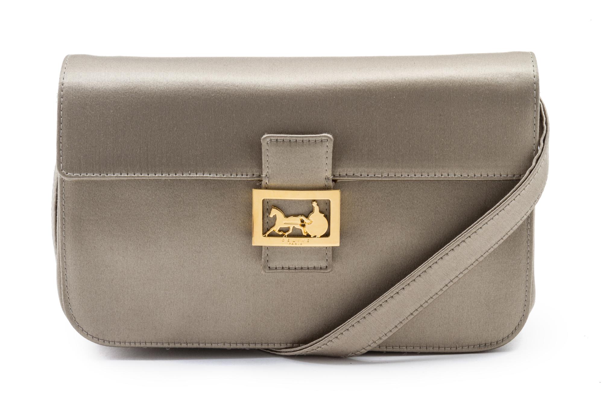 A Celine Taupe Satin Clutch, 7 1/2 x 4 x 2 inches.