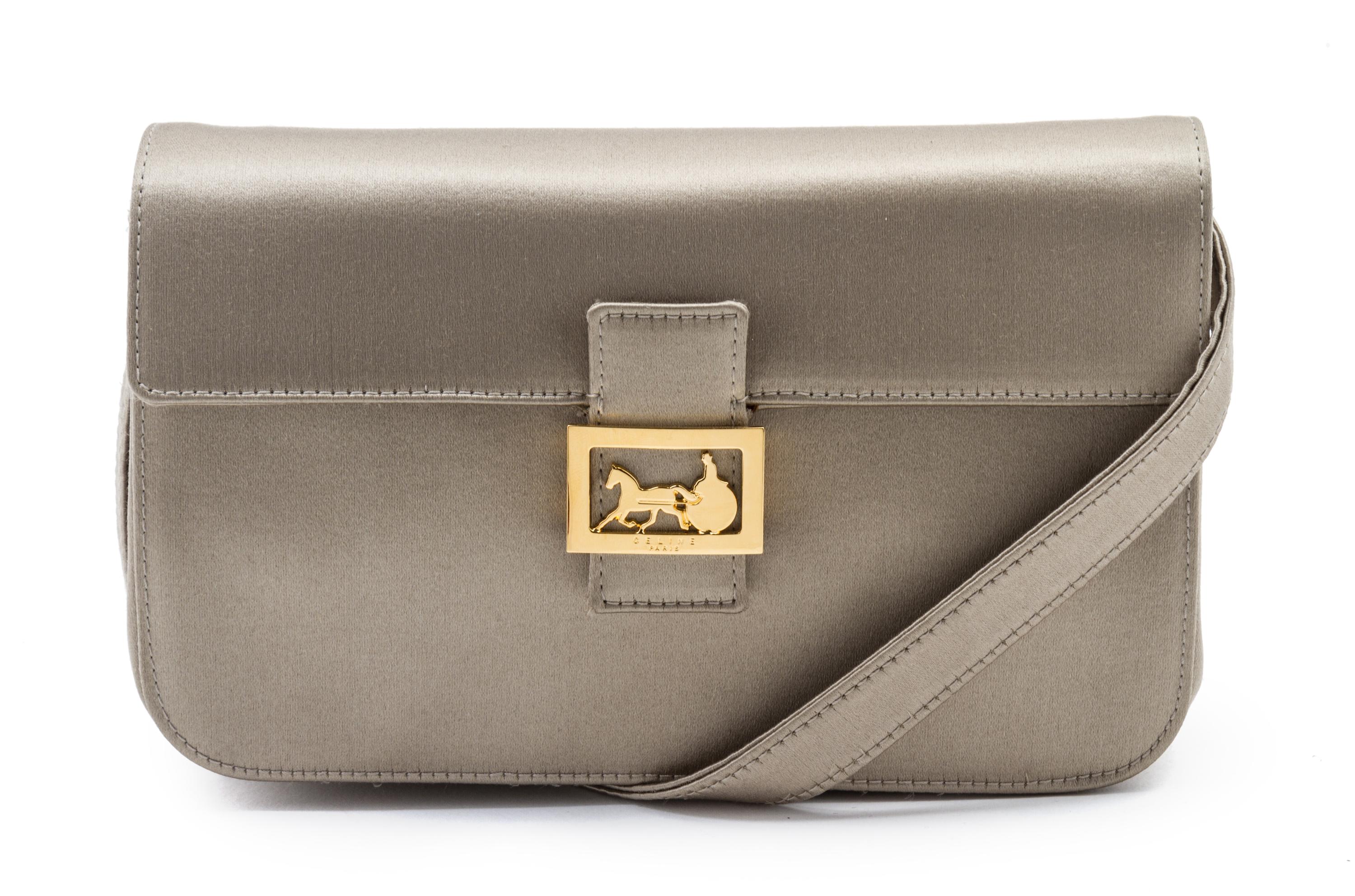 A Celine Taupe Satin Clutch, 7 1/2 x 4 x 2 inches.