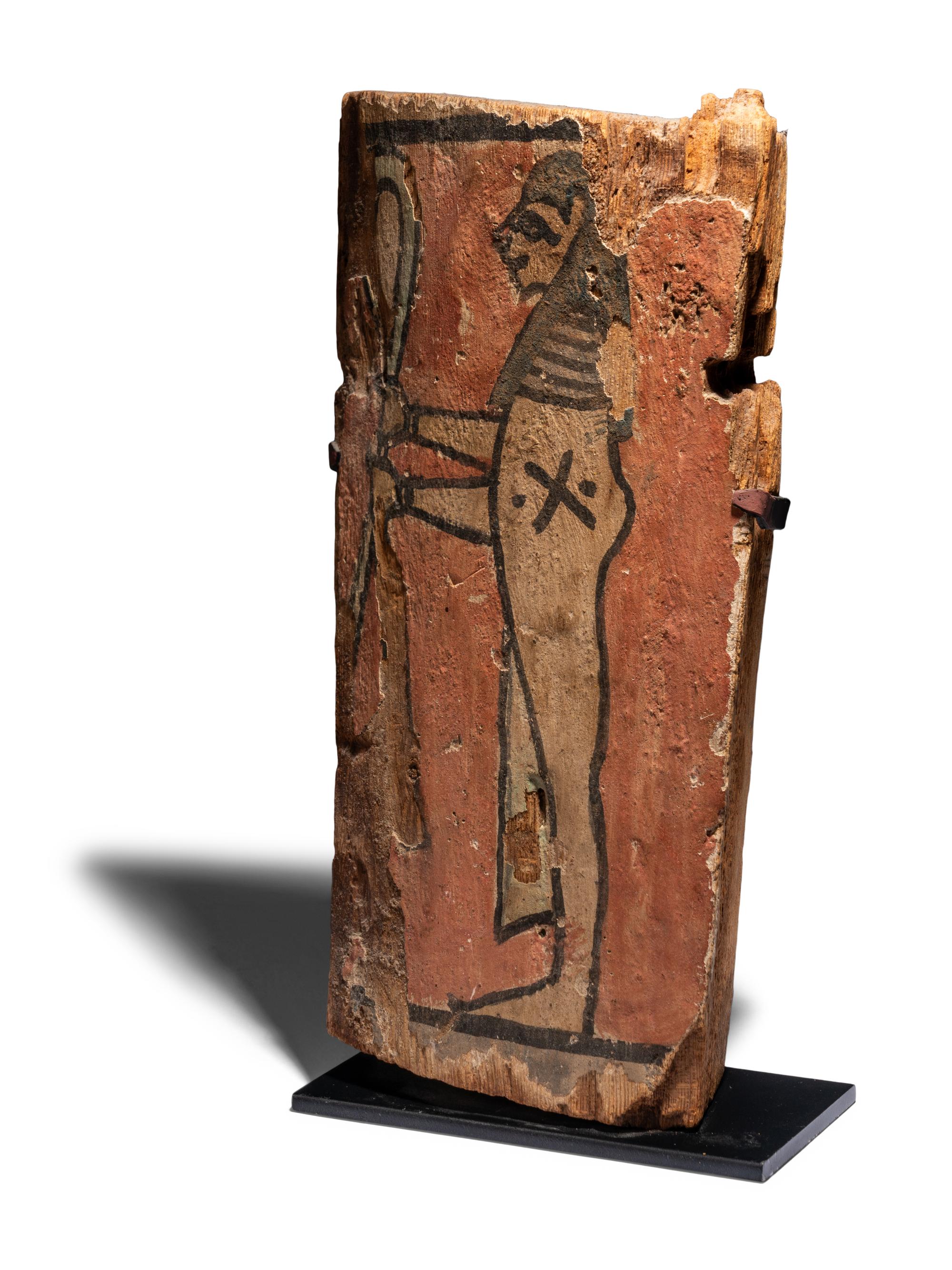 An Egyptian Painted Wood Sarcophagus Fragment
