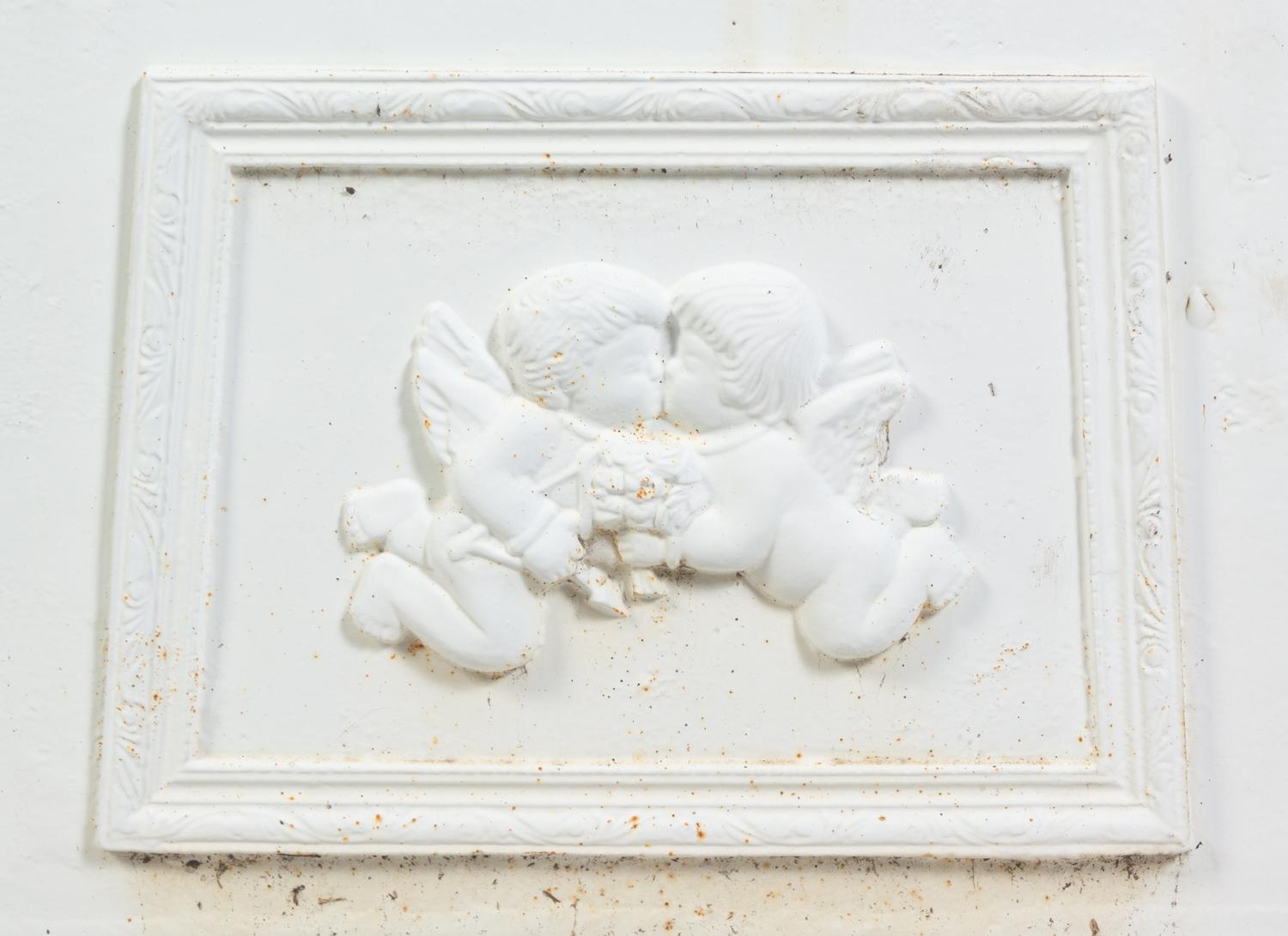 A Set of Four Victorian Style Painted Cast Iron Urns and Plinths