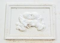 A Set of Four Victorian Style Painted Cast Iron Urns and Plinths