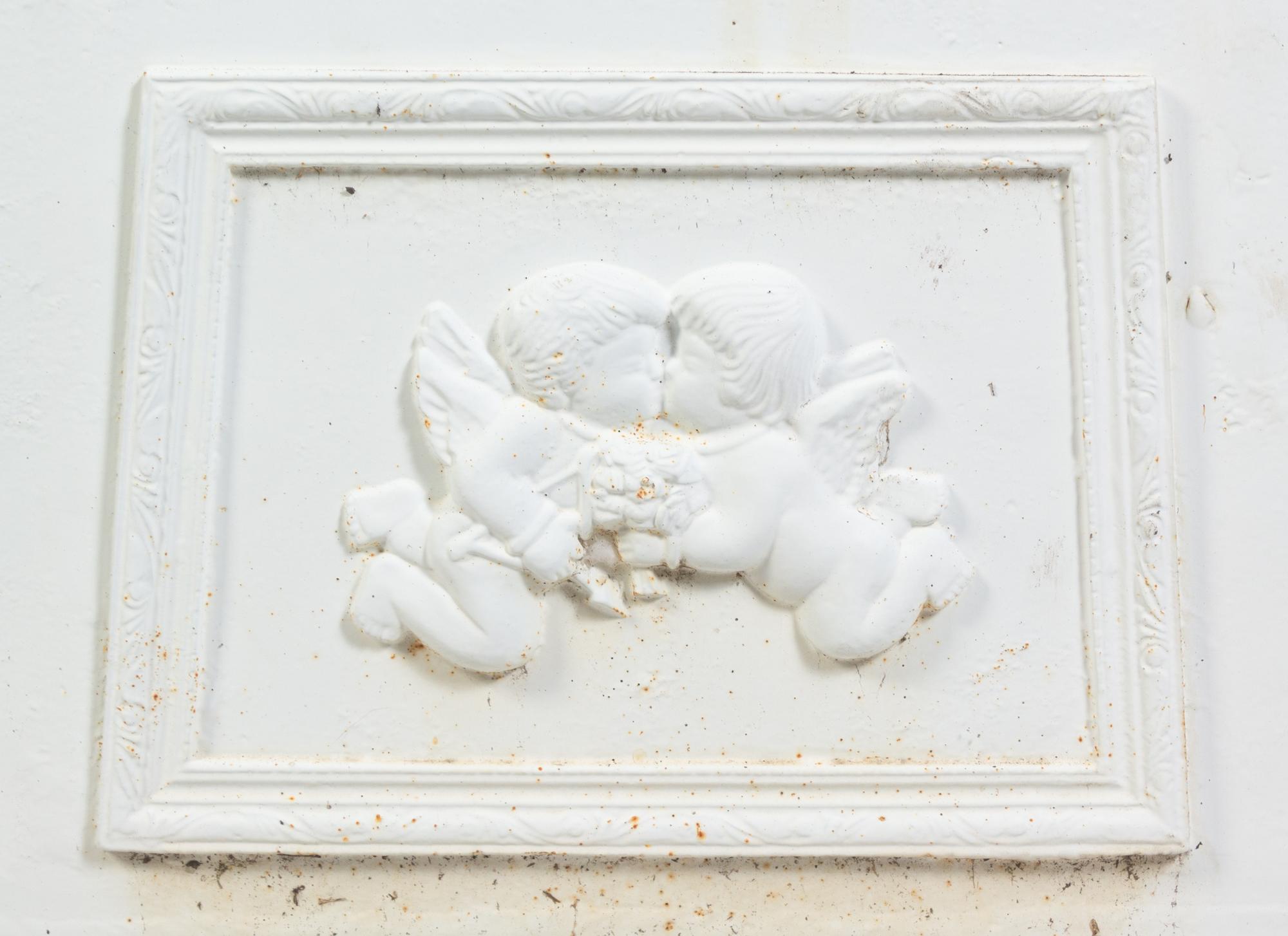 A Set of Four Victorian Style Painted Cast Iron Urns and Plinths
