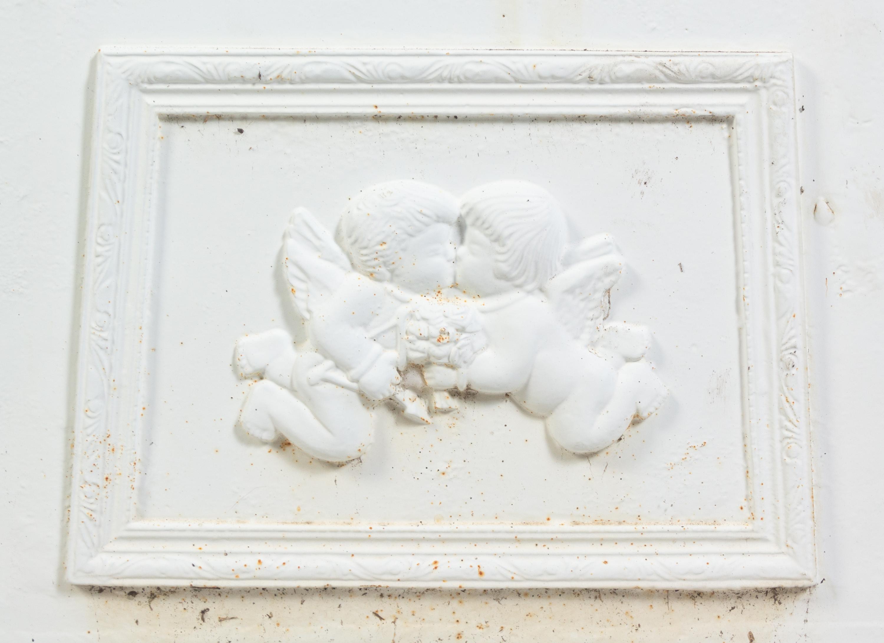 A Set of Four Victorian Style Painted Cast Iron Urns and Plinths