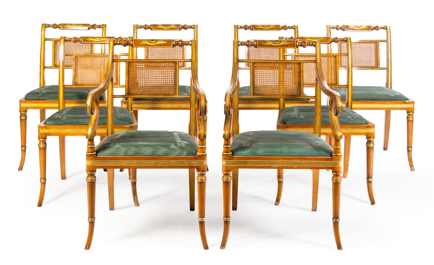A Set of Eight Regency Style Parcel Gilt Fruitwood Dining Chairs Height 36 inches. — 20TH CENTURY