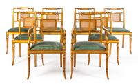 A Set of Eight Regency Style Parcel Gilt Fruitwood Dining Chairs Height 36 inches. — 20TH CENTURY
