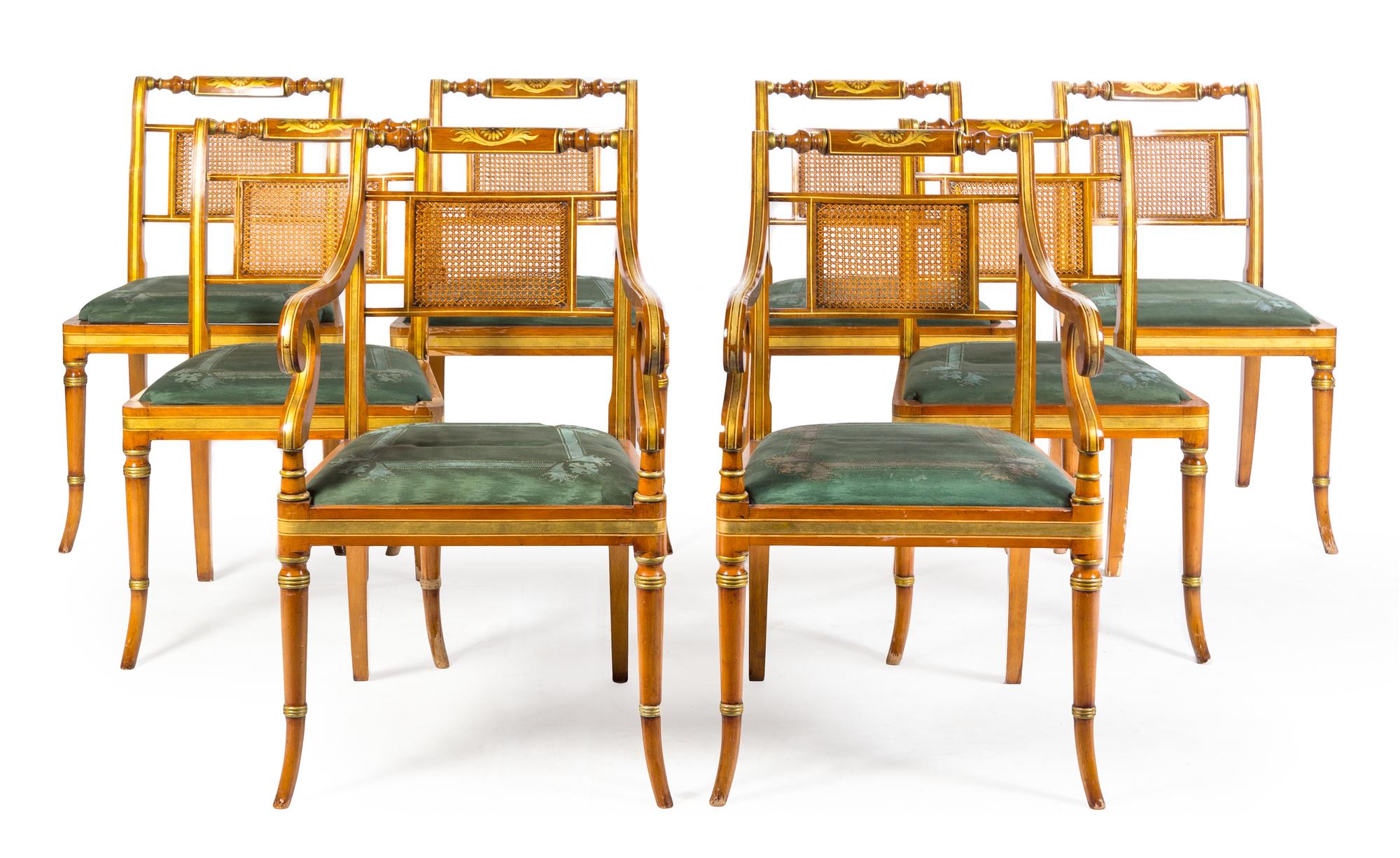 A Set of Eight Regency Style Parcel Gilt Fruitwood Dining Chairs Height 36 inches. — 20TH CENTURY