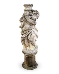 A Cast Stone Figure of a Putto Holding a Cornucopia — 20TH CENTURY