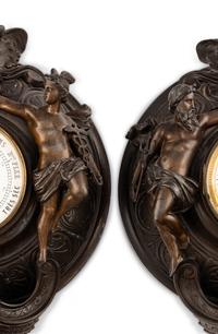 A French Cast Metal Clock and Barometer