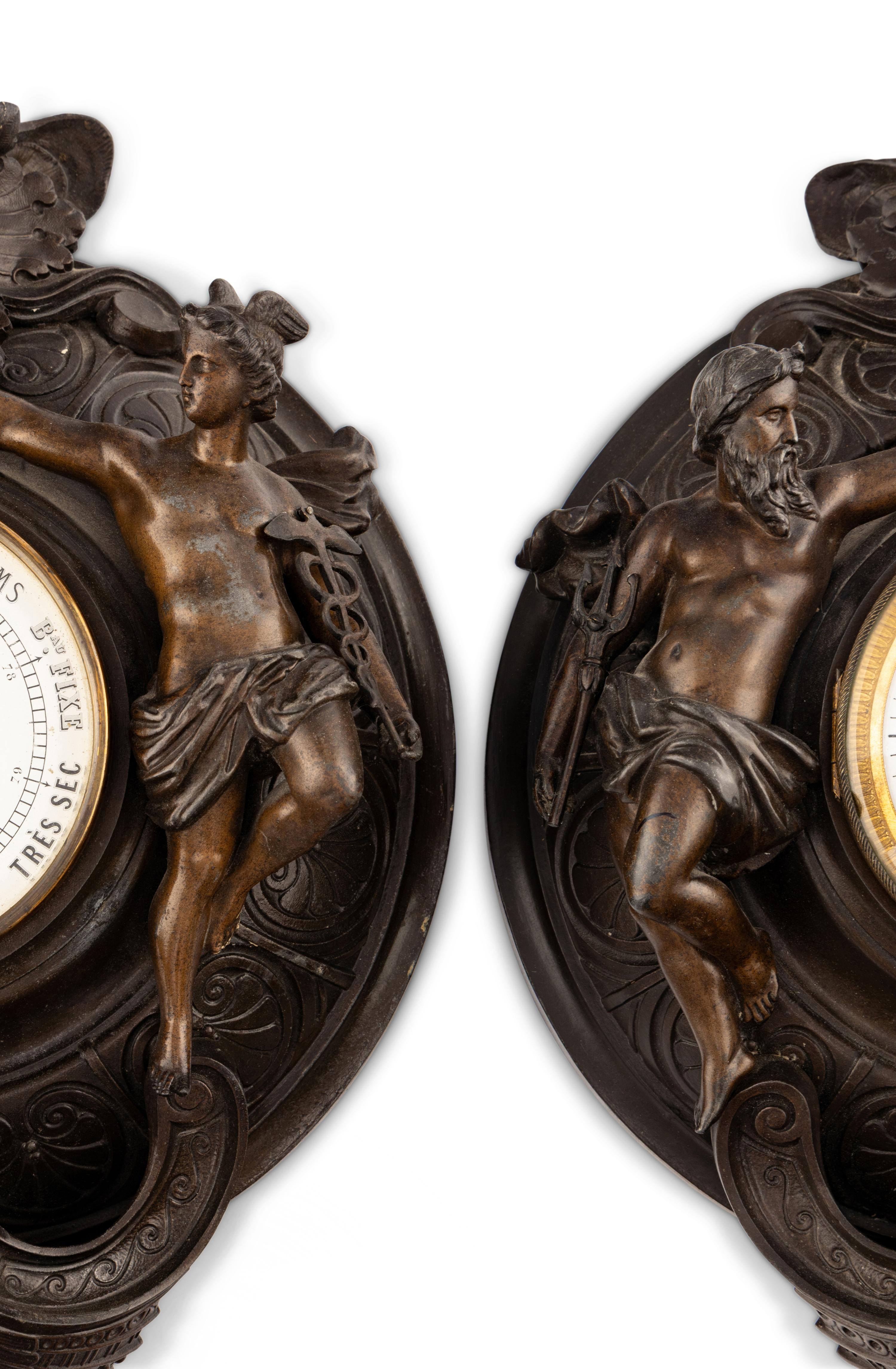 A French Cast Metal Clock and Barometer