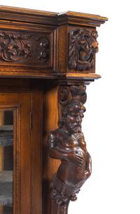 An R.J. Horner Carved Oak Man of the Mountain Serving Cabinet