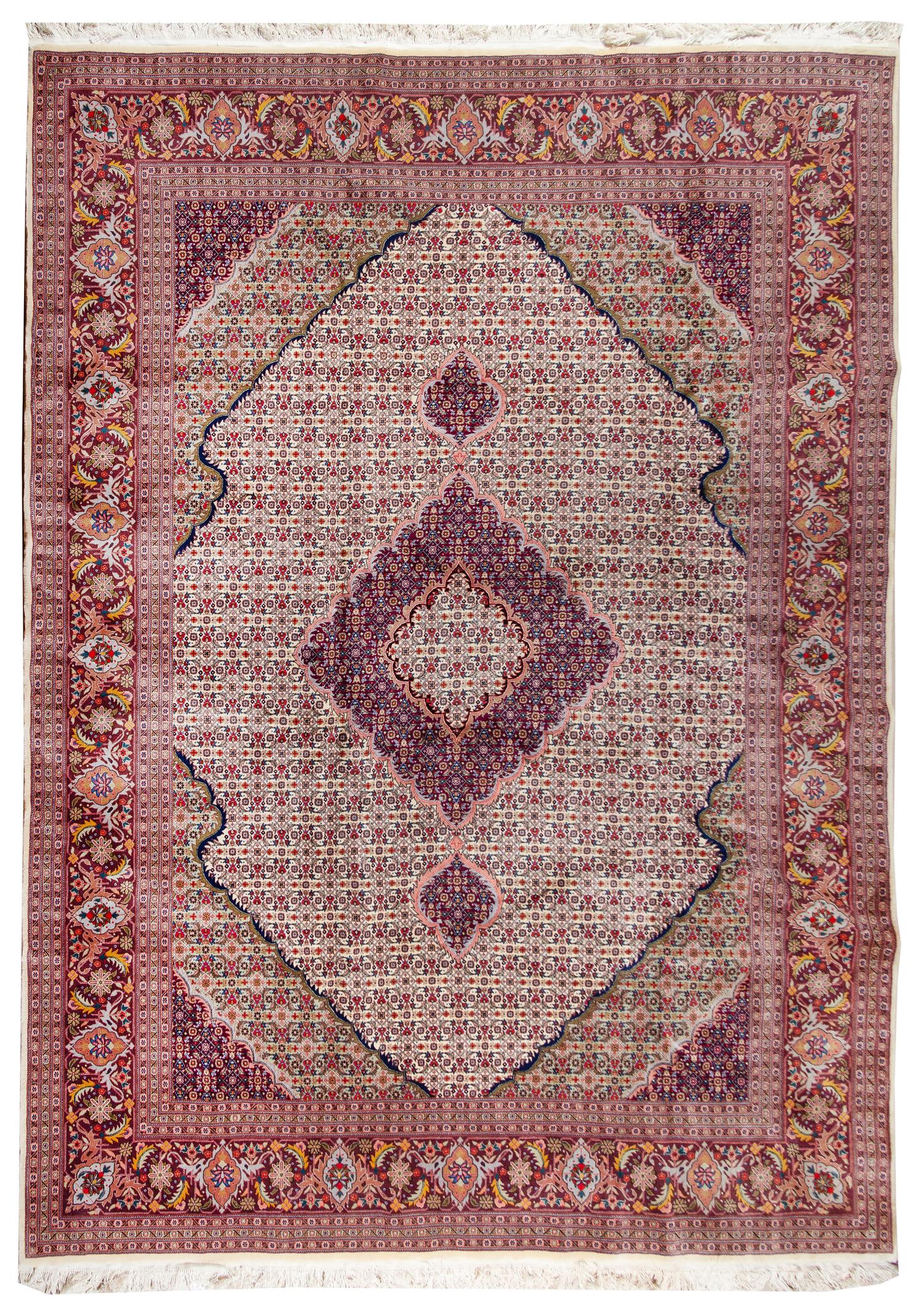 A Tabriz Wool and Silk Rug 12 feet x 8 feet 11 inches. — 20TH CENTURY