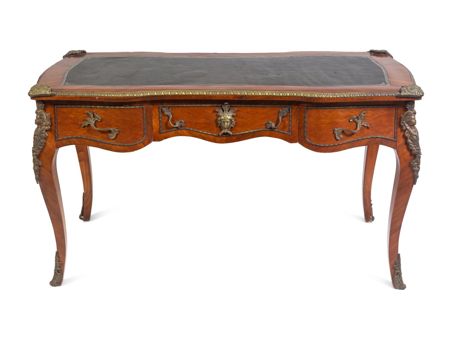 A Louis XV Style Gilt Metal Mounted Walnut Bureau Plat