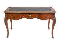 A Louis XV Style Gilt Metal Mounted Walnut Bureau Plat